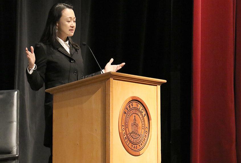 poly prep context min jin lee speaking at podium